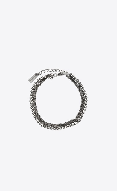 Three-row bracelet in metal